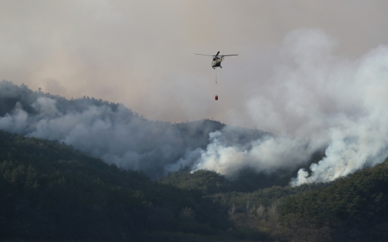 English listening test halts helicopters fighting forest fires