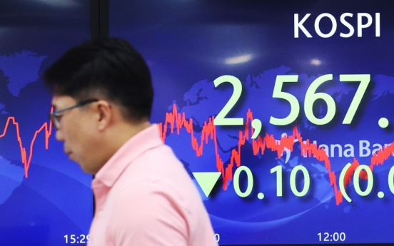 Seoul shares open slightly higher on chip shares