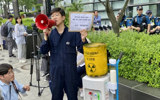 Environmental group protests Fukushima wastewater discharge plan