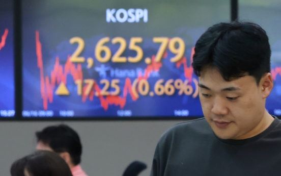 Seoul shares open lower on Fed's hawkish rate outlook