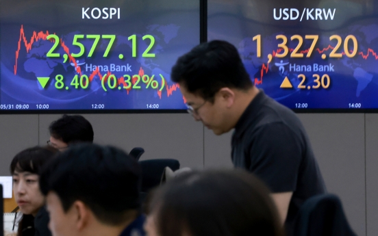 Seoul shares open lower ahead of China's rate decision