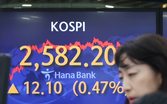 Seoul shares end higher on tech, auto gains