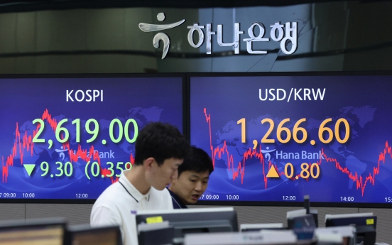 Seoul shares open lower amid lingering rate hike concerns