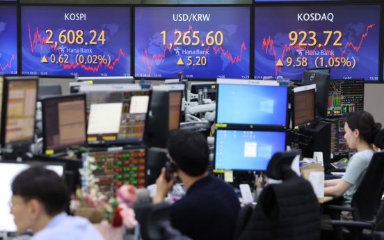 Seoul shares open lower amid rate hike woes