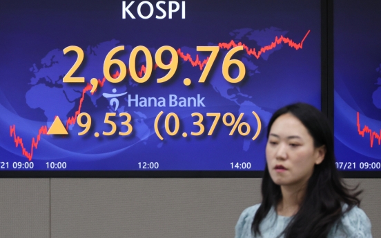 Seoul shares end slightly higher on individual buying