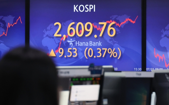 Seoul shares open lower ahead of corporate earnings reports