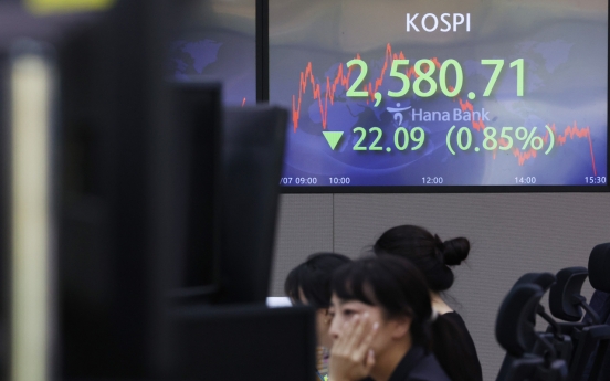 Seoul shares open higher on US gains amid rate hike woes