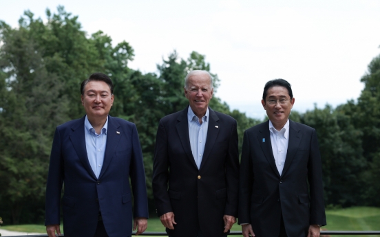 Yoon returns home from Camp David summit with Biden, Kishida