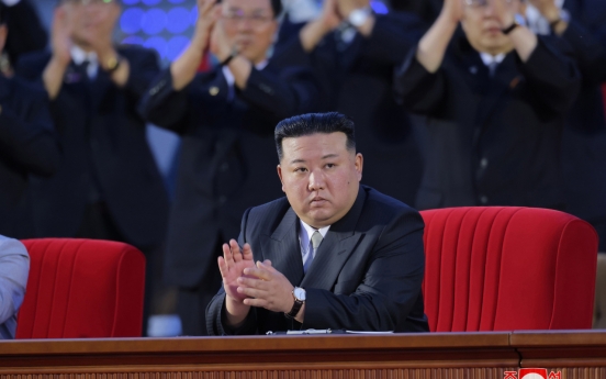 N. Korean leader attends paramilitary parade to mark key anniversary