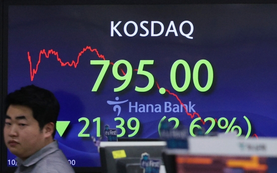 Seoul shares open higher on US gains after Fed comments