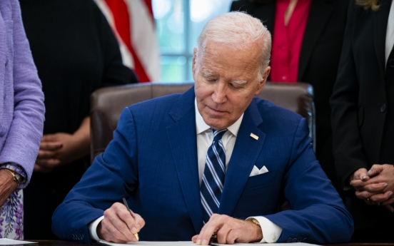 Biden says US not trying to 'decouple' from China, but seeks improved ties