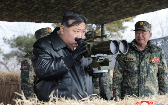 NK leader guides artillery firing drills involving border units capable of striking 'enemy's capital'