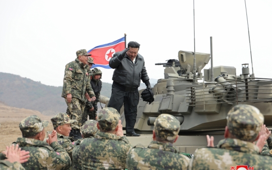 N. Korea unveils new battle tank with leader Kim boasting their striking power