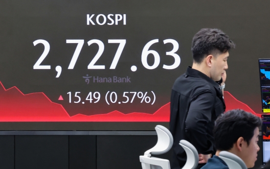 Seoul shares end higher on rate-cut hopes after jobs data