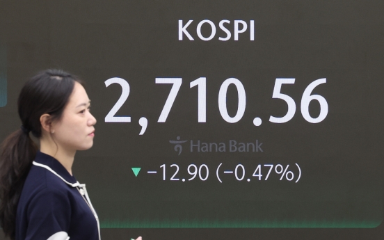 Seoul shares open lower on Fed minutes