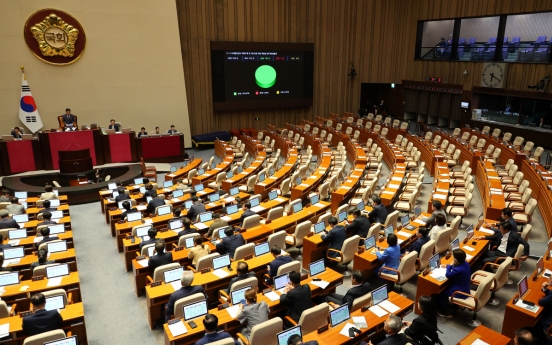 Govt. to enact Sewol ferry victim support act, request veto on contentious bills