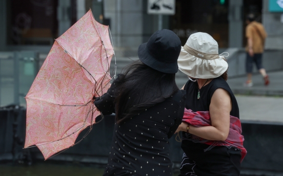 Heavy rainfall soaks Korea as summer rainy season begins