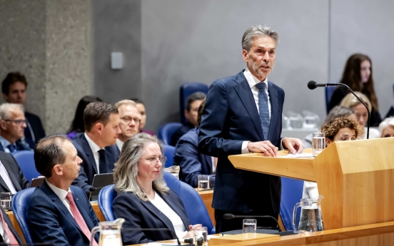 New Dutch leader pledges to cut immigration as the opposition vows to root out racists in cabinet