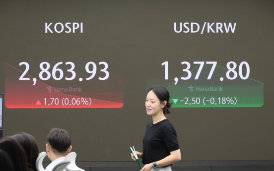 Seoul shares open tad higher on US rate-cut hopes