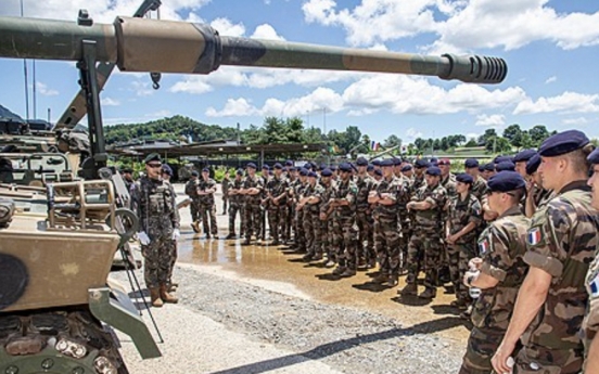 Defense chief vows to strengthen solidarity with France
