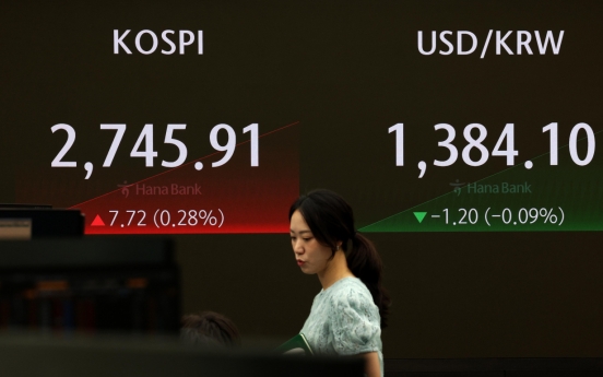 Seoul shares open higher on rate cut hopes