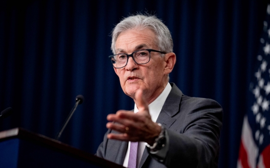 Fed freezes key rate for 8th straight time, hints at September cut possibility