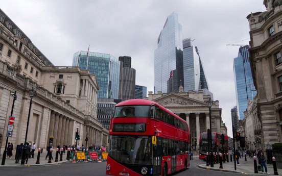 Bank of England cuts rates from 16-year high, 'careful' on future moves