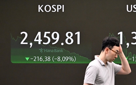 Korean shares tank as global rout continues