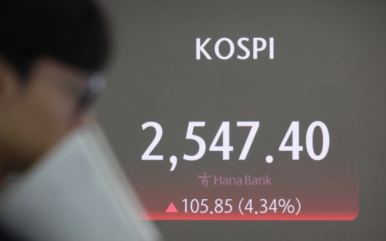 Seoul shares open sharply higher after worst crash