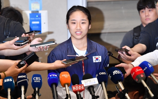 Badminton gold medalist says she's not picking fights with natl. federation