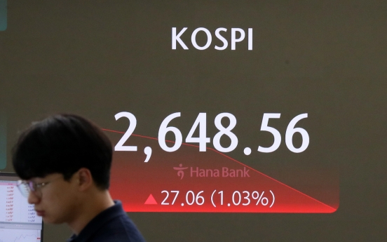 Seoul shares open higher on Wall Street gains