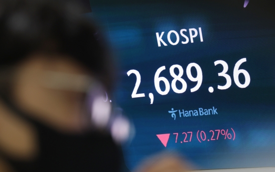 Seoul shares open lower on Wall Street losses