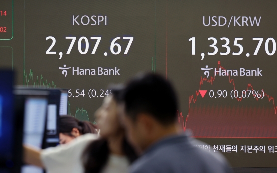 Seoul shares up for 3rd day as investors weigh BOK's rate freeze, Fed chief's speech