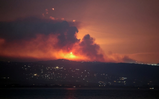 Hezbollah launches missile barrage after Israel strikes