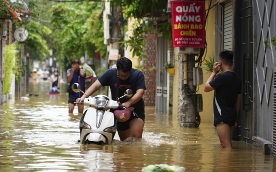 Vietnam typhoon death toll rises to 233 as more bodies found in areas hit by landslides and floods