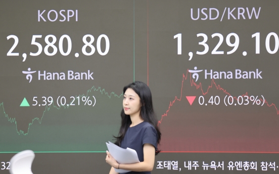 Seoul shares end higher after Fed's rate cut