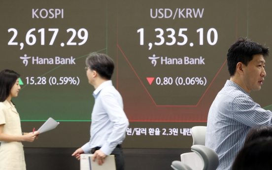 Seoul shares open higher on US gains