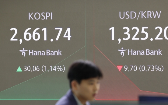 Seoul shares open higher on Wall Street gains