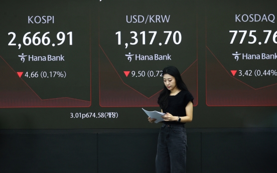 Seoul shares open tad higher on Wall Street gains