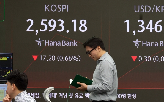 Seoul shares open lower over weak Samsung earnings, US losses