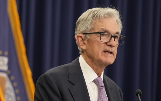 US Fed cuts key lending rate by quarter-percentage point