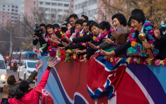 N. Korea's World Cup-winning footballers get heroes' welcome home