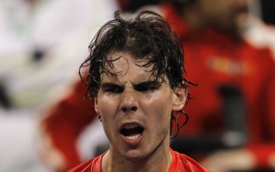 Nadal, Federer through in Qatar Open