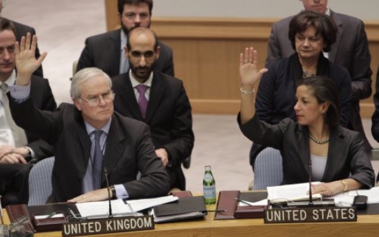 U.N. slaps sanctions on Gadhafi