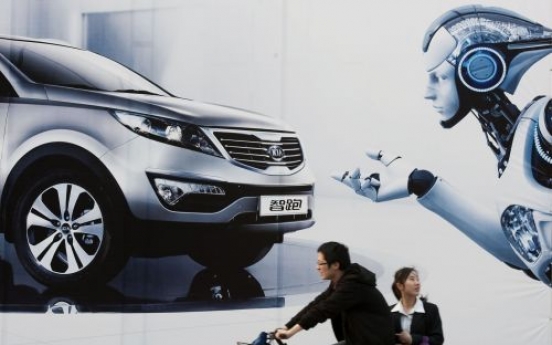 Automakers unveil new models at China show