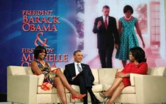 Obama goes to Chicago for Oprah, NYC for money
