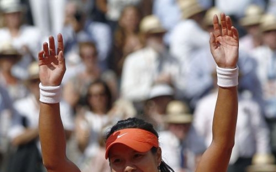 Li Na becomes first Chinese to win Grand Slam singles title