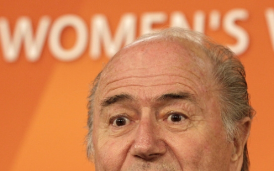 Blatter talks WC soccer, not bribery allegations