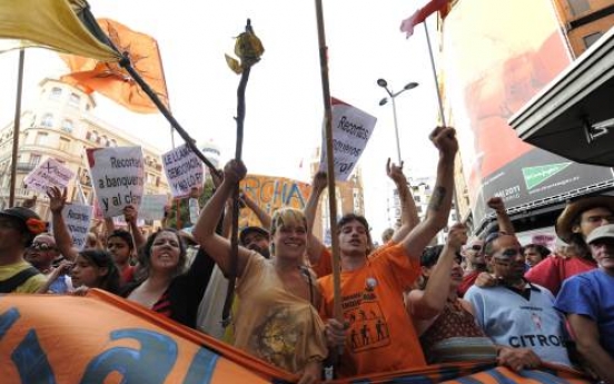 Protest marches converge on Spain’s capital