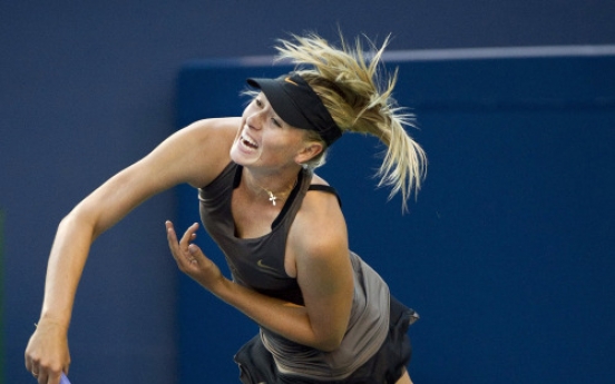 No. 1 Wozniacki loses opening match